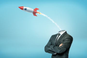 A businessman with crossed arms and with a small launched old-school rocket instead of his head.