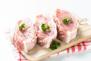 Pork meat steak on white.
