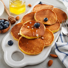 Classic american pancakes with fresh berry and honey.