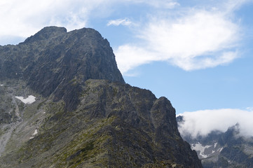 Fototapeta na wymiar Crest and peaks of Tatra Mountains view from the mountain Velka Svistovka. Slovakia