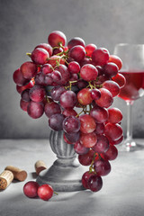 Ripe grape bunch  and glass of wine. Still life concept - 221863096