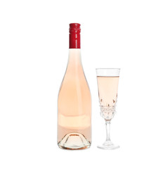 Bottle and glass with rose champagne on white background. Festive drink