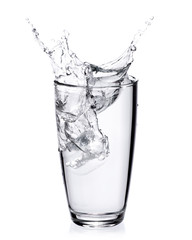 Water splash out of glass isolated on white background.