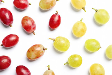 Fresh ripe juicy grapes on white background, top view
