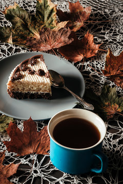 Slice Of Cake With Tea In Autumn In The Park