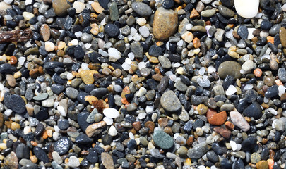 Wet stones on the beach in Crete Island, Greece
