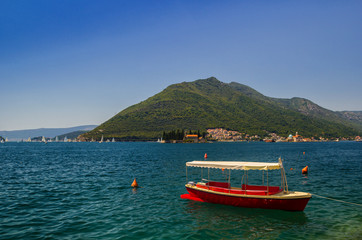 Fototapeta na wymiar Sunny Mediterranean landscape. Montenegro, Bay of Kotor.