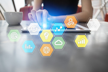 Colored applications icons and graphs on virtual screen. Business, internet and technology concept.