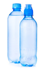 Naklejka premium Plastic bottle of still healthy water isolated on white background