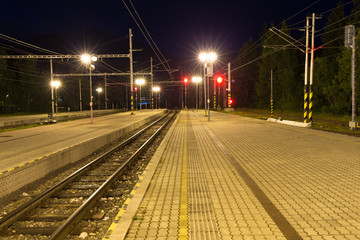 Fototapeta na wymiar narrow-gauge railway station at night