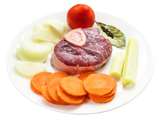 prepared raw products on white plate cutout