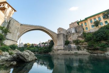 Fototapeta na wymiar Stari Most in Mostar, Bosnia and Herzegovina, The Old Bridge in Mostar with emerald river Neretva.