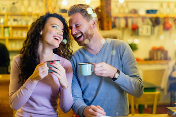 Romantic couple having date in coffee shop