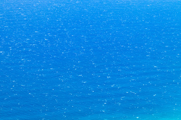 Overhead view of waves on an open blue ocean in the Pacific Ocean