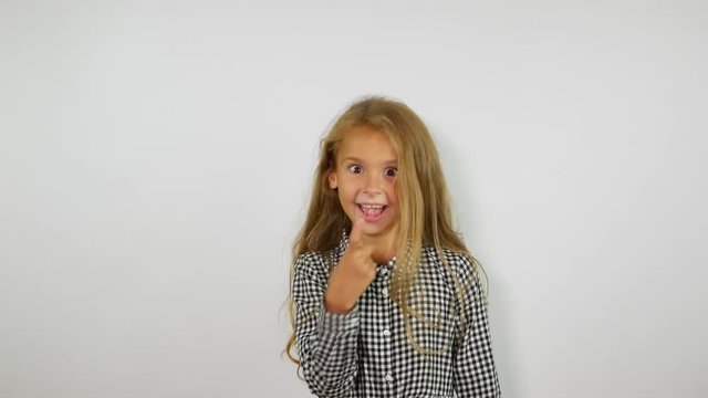 A cheerful girl appears in the frame, calls to follow and goes away.