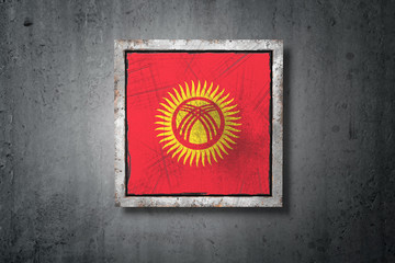 Kyrgyzstan flag in concrete wall
