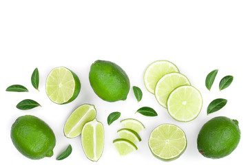 Fototapeta na wymiar sliced lime vith leaves isolated on white background with copy space for your text. Top view. Flat lay pattern
