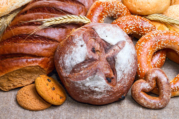 Fresh bread and bakery in the form of background, close-up and with selective focus