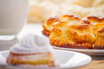 Cheese curd dish for breakfast - sweet cottage cheese pancakes, syrniki, curd fritters, selective focus