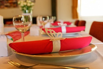Table Setting cutlery with pink napkin close up macro