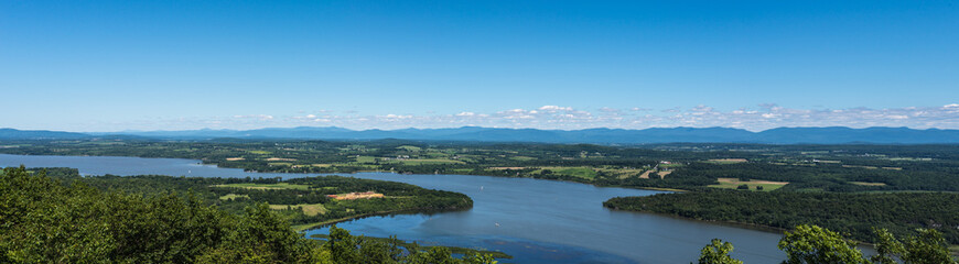 Fototapeta na wymiar Lake Champlain from Mt. Defiance. Green Mountains are visible. Fort Ticonderoga is visible on the peninsula.