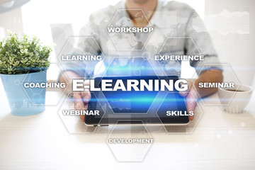 E-Learning on the virtual screen. Internet education concept.