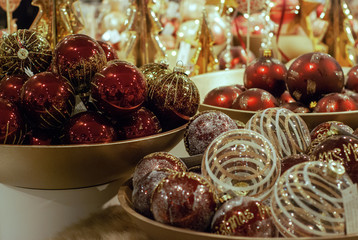 Christmas decoration ball : Red and Gold Color of Christmas balls in bowl . Decoration for Christmas and New Year Holiday party.Festive, lights background