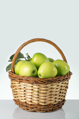 green apples in a basket