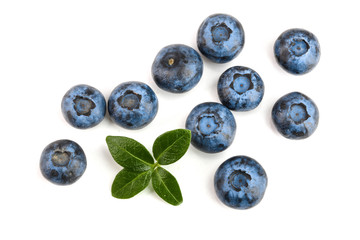 fresh ripe blueberry with leaf isolated on white background. Top view. Flat lay pattern
