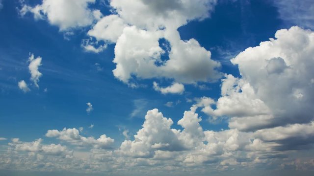 White clouds in blue sky time lapse