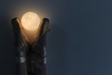 Ballerina legs with moon lamp © CESARVR