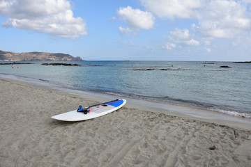 Surfing board on Elafonissi beach in Crete, Greece