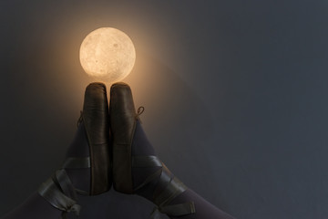 Ballerina legs with moon lamp © CESARVR
