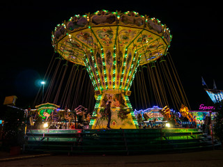 Night fair in Bavaria with a lot of fun in neon