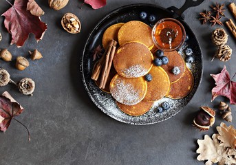 Pumpkin pancakes with fresh bluberry.