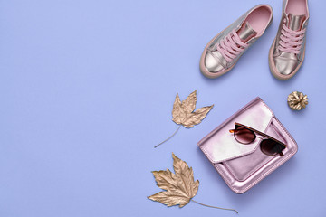 Autumn Fashion. Woman Gold Accessories Set. Minimal Creative Flat lay. Trendy Handbag, Glamour Shoes, Stylish Sunglasses. Luxury Fall Hipster Girl Outfit, Maple Leaf.
