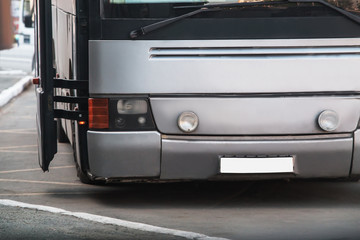 Bus at transport stop © Yuri Bizgaimer