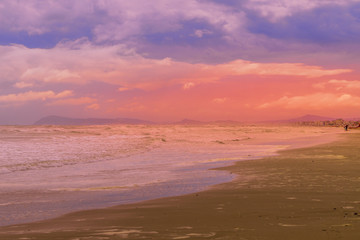 Fototapeta na wymiar sunset at beach on a bad weather day