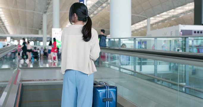Woman go for a trip in the airport