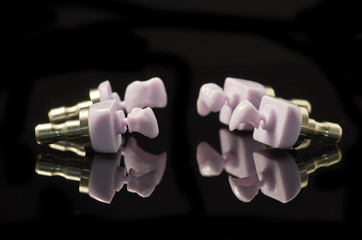 Four molars of lithium Disilicate glass-ceramic block for the CAD CAM technology.