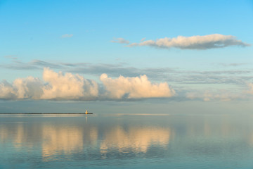Still waters around Indian Head Lighthouse at the mouth of Summerside Harbour, Prince Edward...