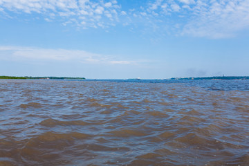 Meeting of Waters. Brazilian rivers confluence from Manaus