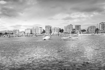 black and white beach on a bad weather day