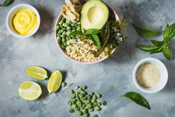 Buddha bowl recipe with quinoa, avocado, lentils, mushrooms, sea kale on concrete background.