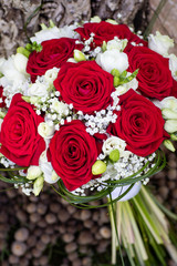 Romantic wedding bouquet for a bride with red roses