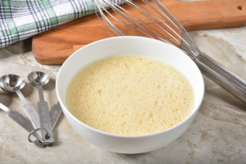 Bowl of beaten eggs