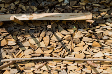 Stack of firewood ready for winter in a backyard