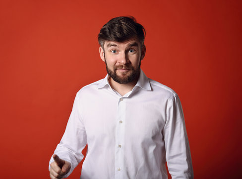 Fun emotional bearded surprising and excited man have an idea on empty copy space orange background
