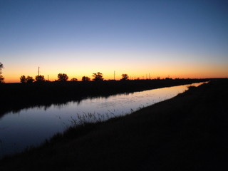 sunset over river