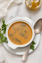 pumpkin soup in white bowl